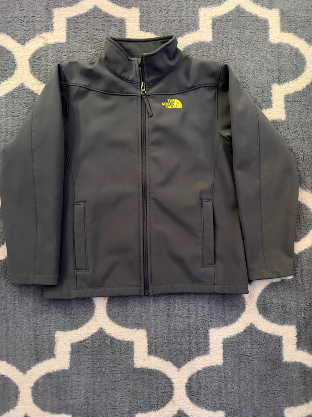 The North Face Kids' Softshell Jacket in Charcoal with Yellow Logo